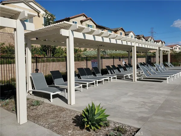 a front view of a house with swimming pool