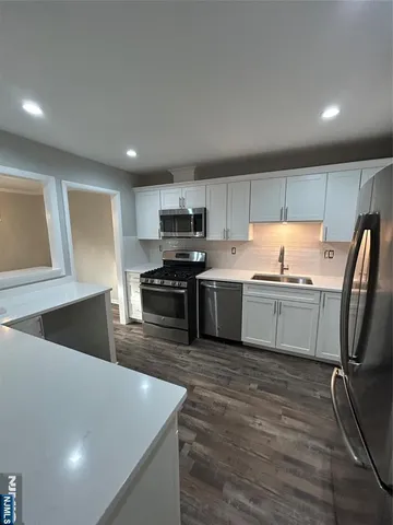 a bedroom with a bed and a table in it