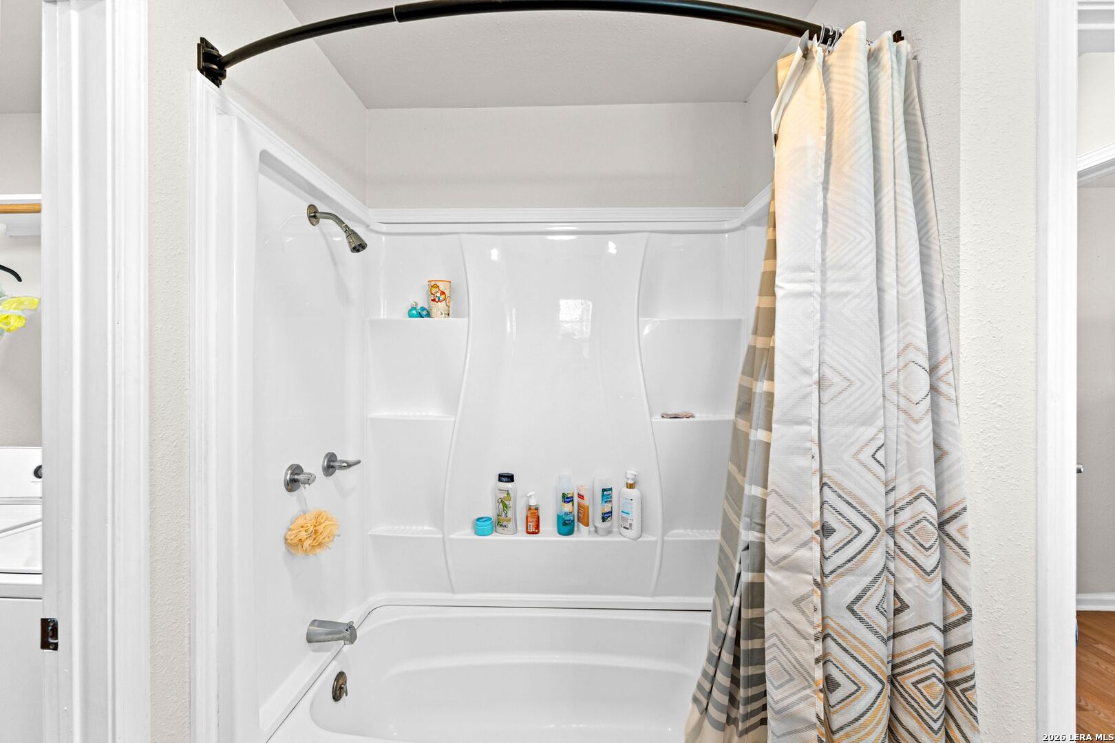 289 Chaparral Drive Bandera, TX 78003 - Photo 18 of 27 a bathroom with a bathtub and a shower