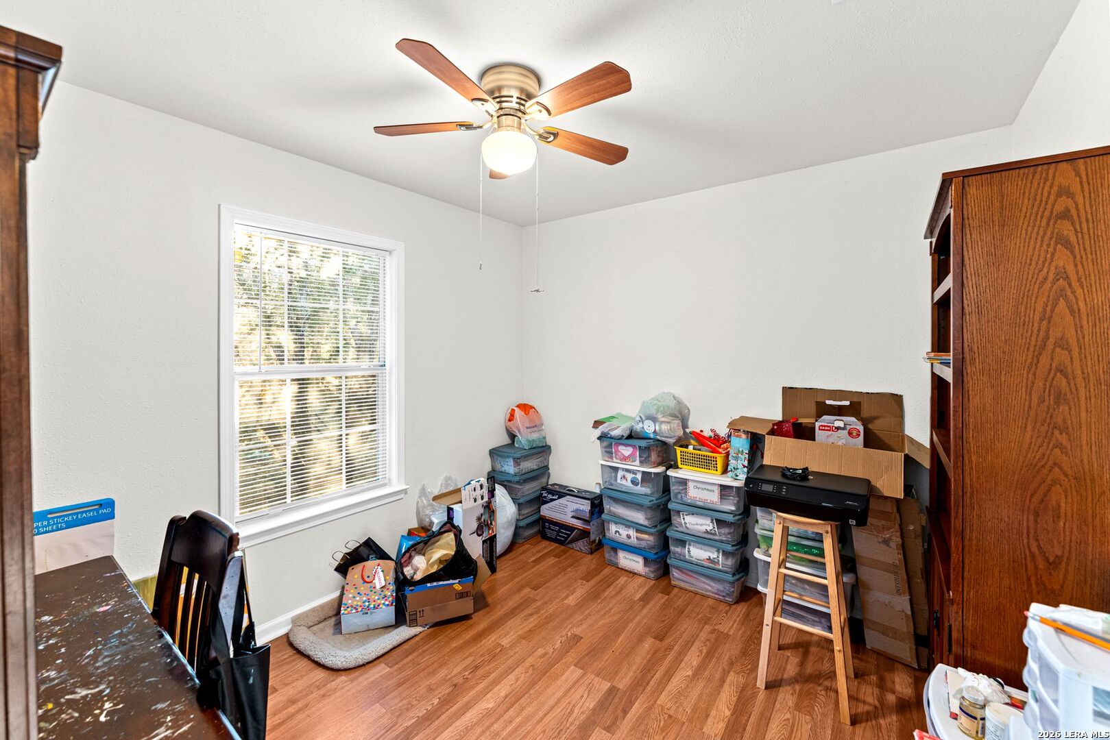 289 Chaparral Drive Bandera, TX 78003 - Photo 22 of 27 a living room with furniture and wooden floor
