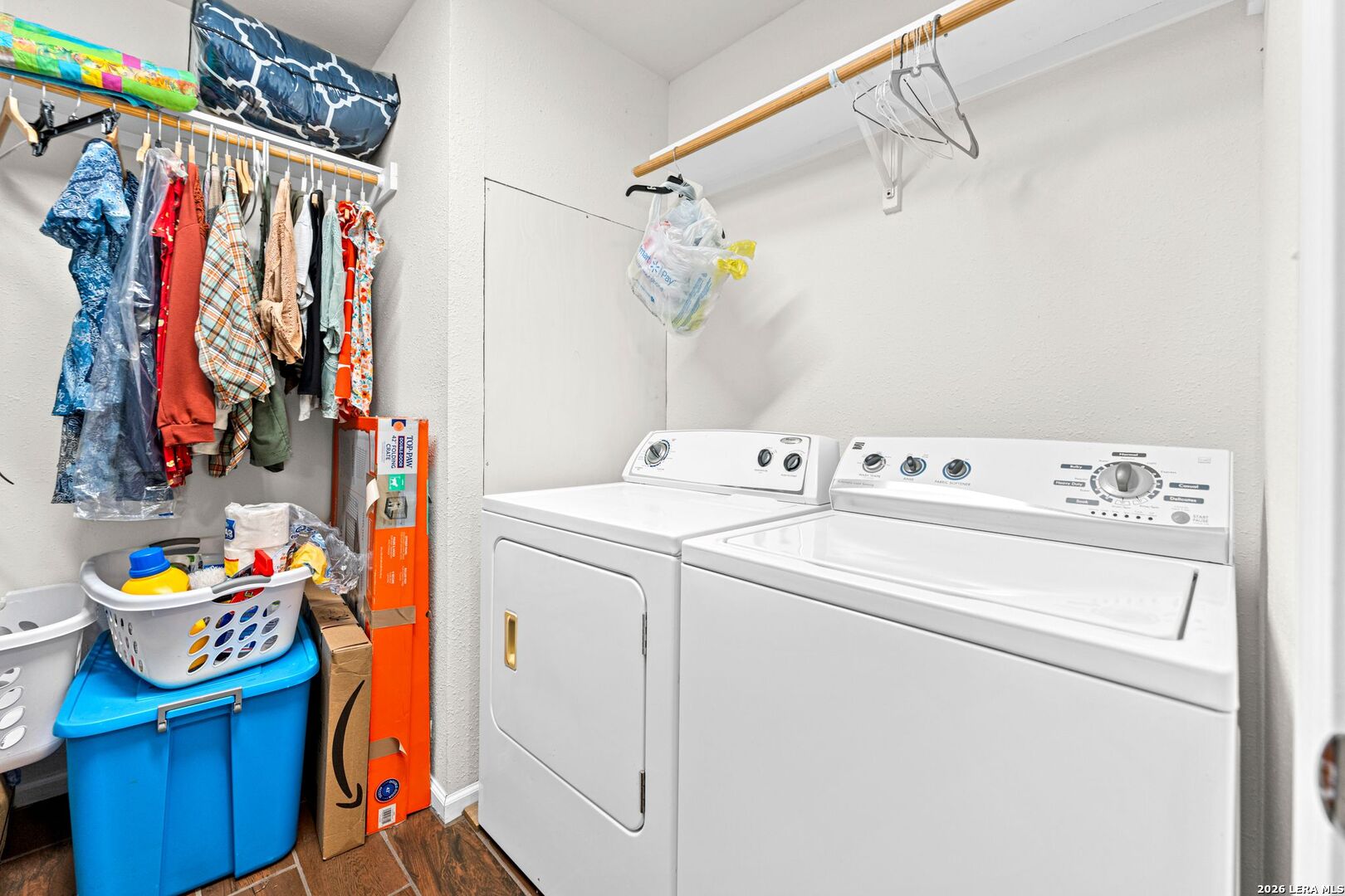 289 Chaparral Drive Bandera, TX 78003 - Photo 25 of 27 a utility room with dryer and washer