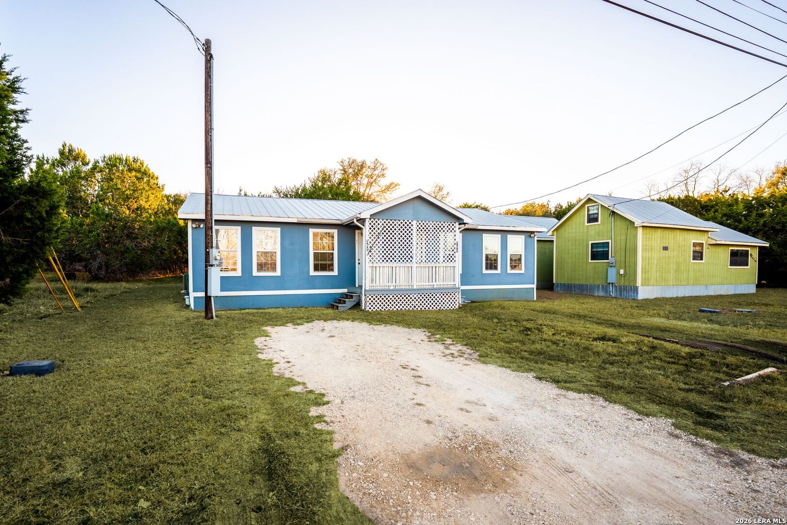 289 Chaparral Drive Bandera, TX 78003 - Photo 5 of 27 a view of a house with a backyard
