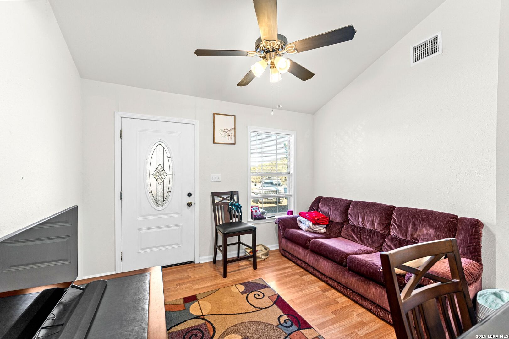 289 Chaparral Drive Bandera, TX 78003 - Photo 10 of 27 a living room with furniture and wooden floor