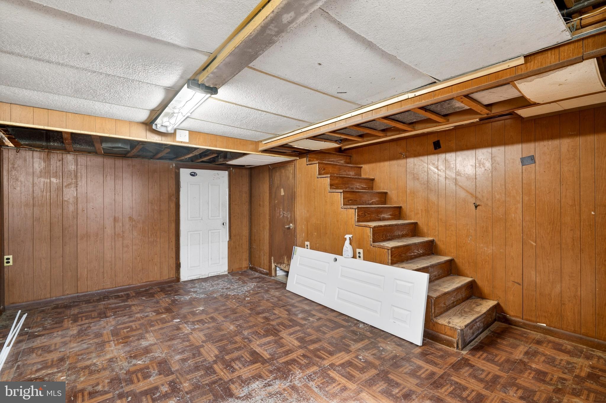 528 Sunset Road Baltimore, MD 21223 - Photo 19 of 27 a view of an empty room with stairs