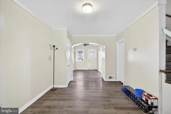 a view of livingroom with hardwood floor and hallway