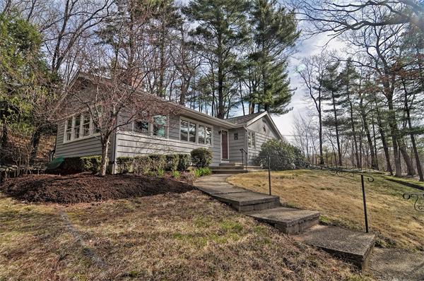 272 Main Street Norfolk, MA 02056 - Photo 24 of 29 a house with trees in front of it