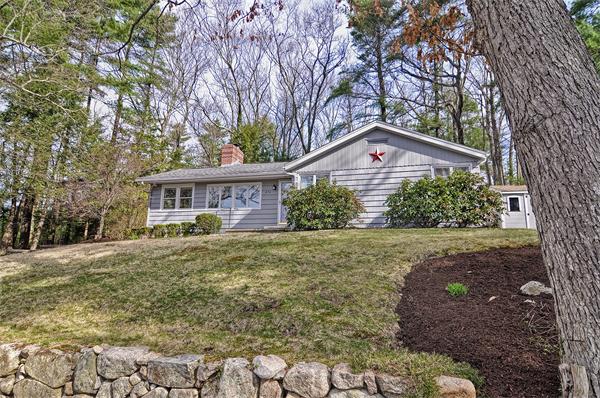 272 Main Street Norfolk, MA 02056 - Photo 28 of 29 a front view of a house with garden
