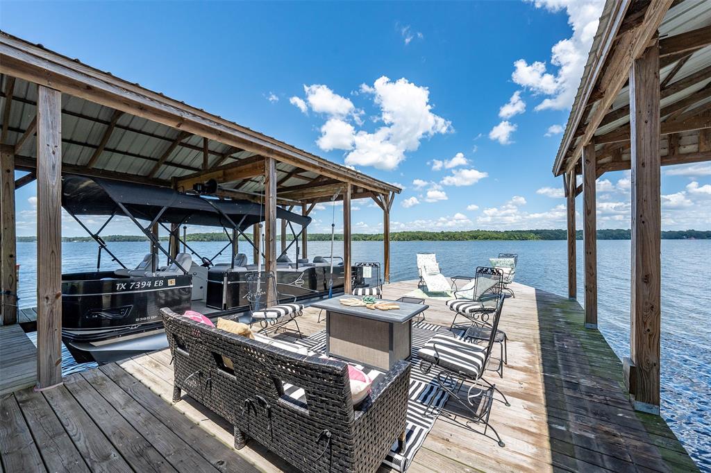 16241 Big Oak Bay Road Tyler, TX 75707 - Photo 37 of 40 Expansive wooden dock with covered boat slips