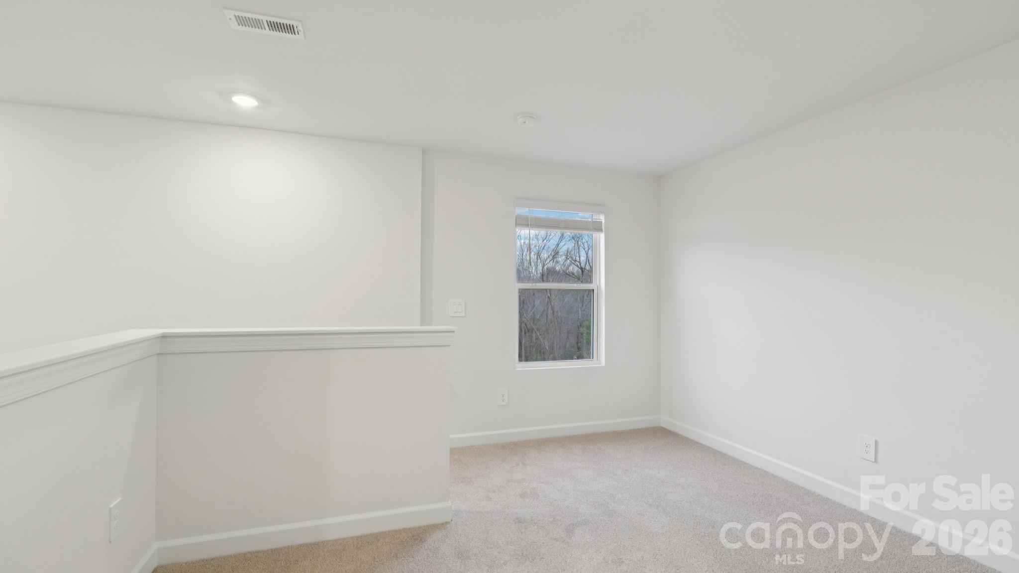 1273 30th St Lane Northeast Conover, NC 28613 - Photo 15 of 21 a view of an empty room with a window