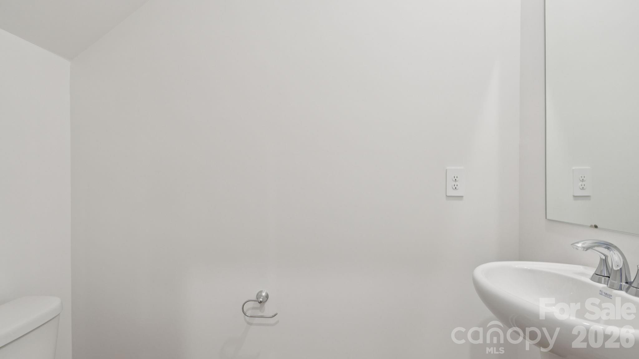 1273 30th St Lane Northeast Conover, NC 28613 - Photo 7 of 21 a bathroom with a sink and a mirror