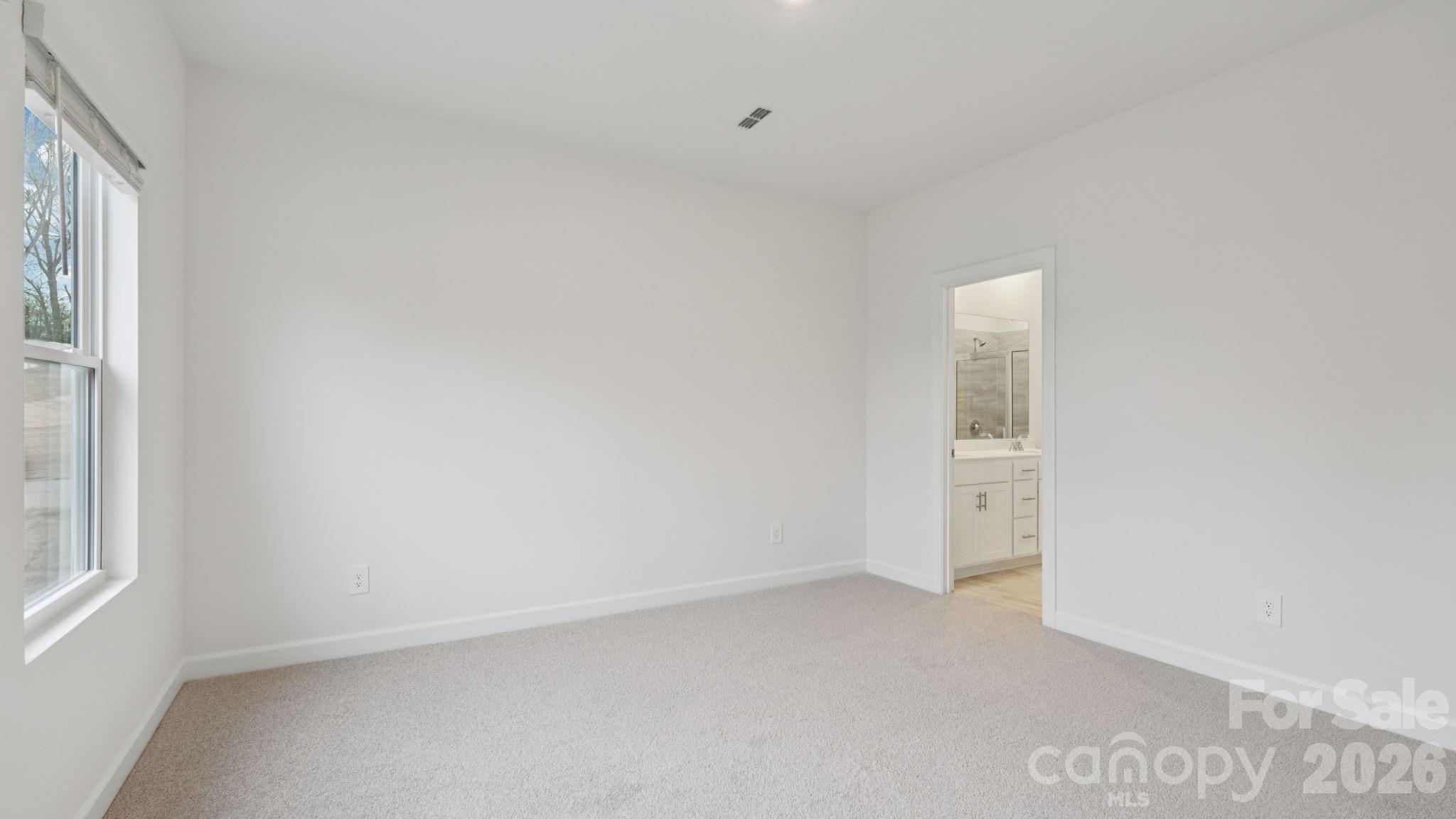 1273 30th St Lane Northeast Conover, NC 28613 - Photo 8 of 21 a view of an empty room and a window