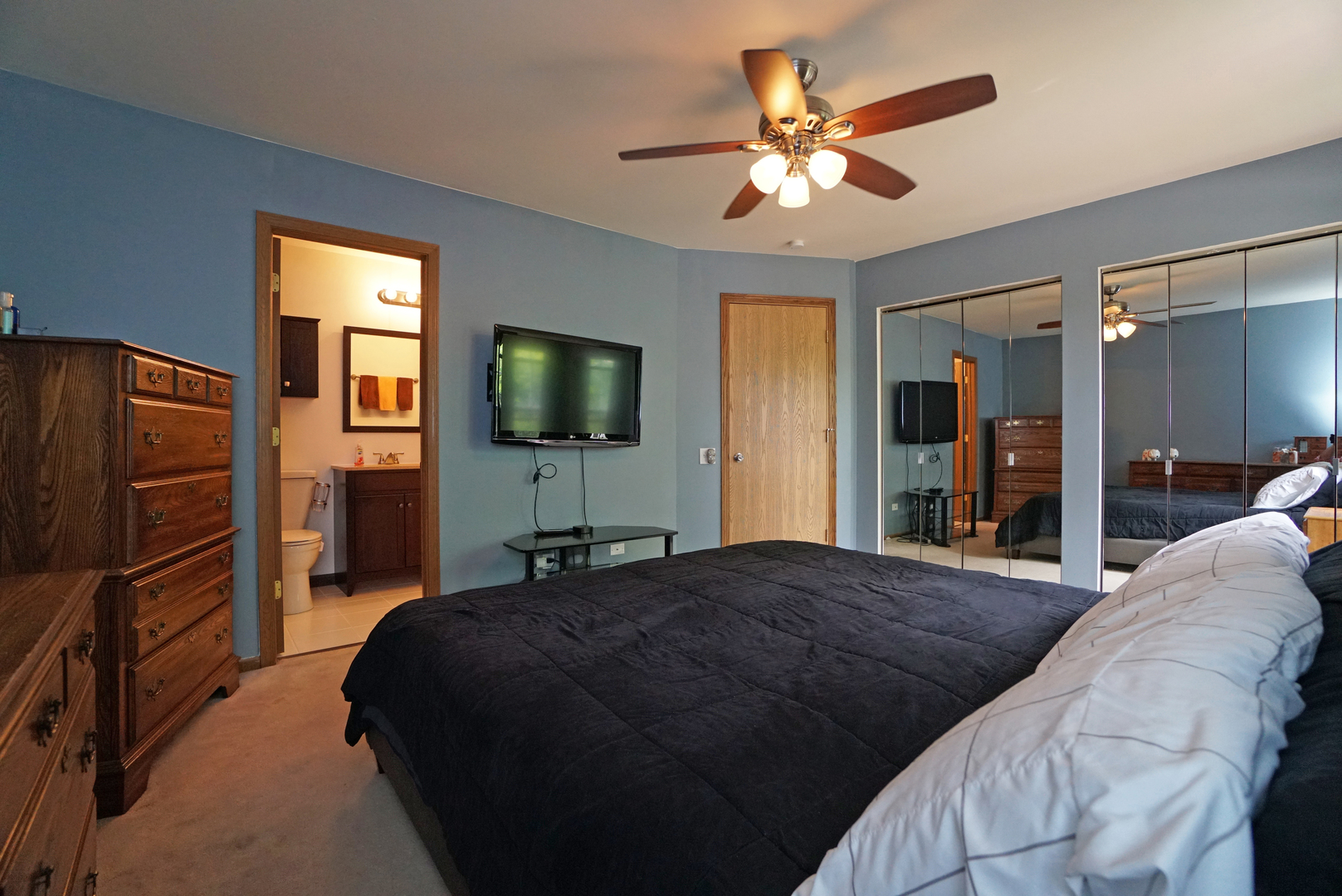 23 North Oltendorf Road Streamwood, IL 60107 - Photo 17 of 35 a living room with a bed furniture and a flat screen tv