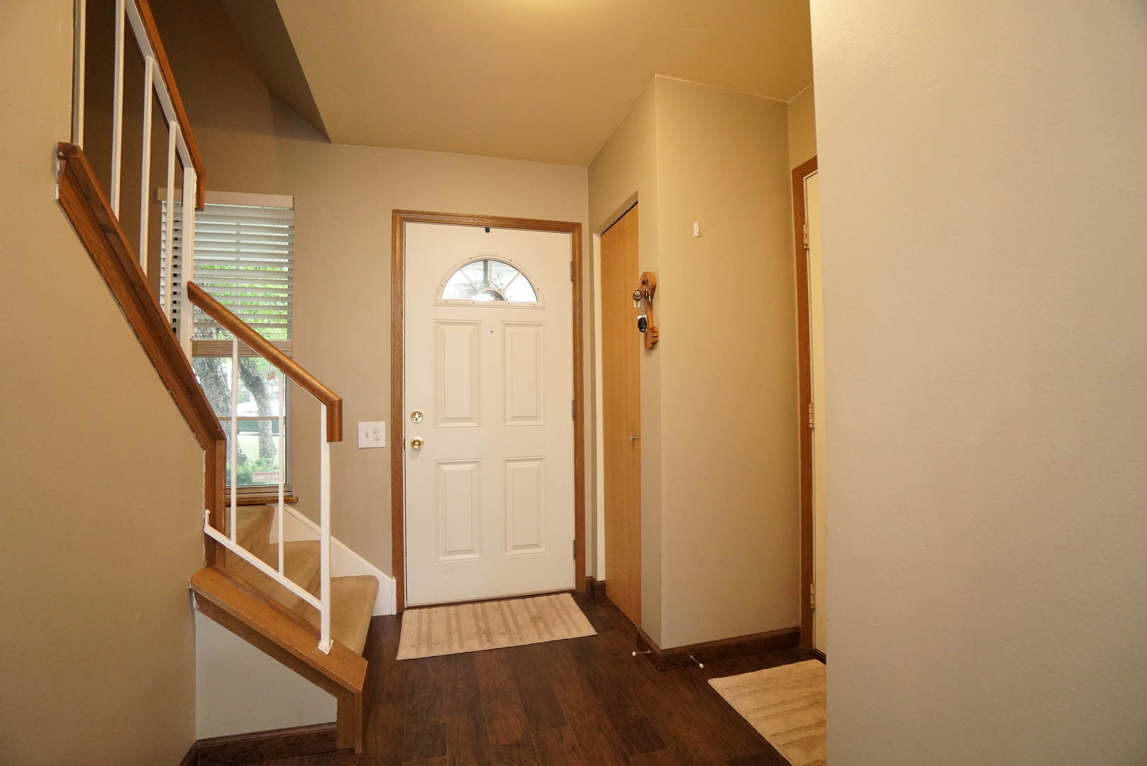 23 North Oltendorf Road Streamwood, IL 60107 - Photo 2 of 35 a view of front door of stairs
