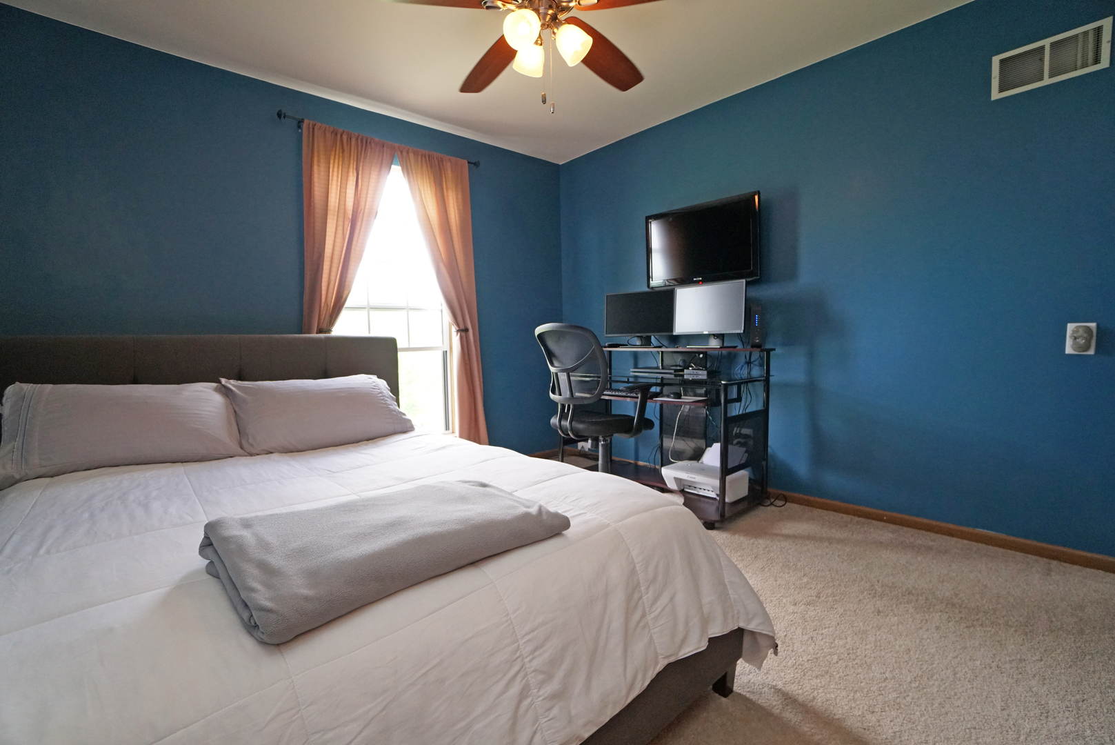 23 North Oltendorf Road Streamwood, IL 60107 - Photo 22 of 35 a bedroom with a bed and a flat screen tv