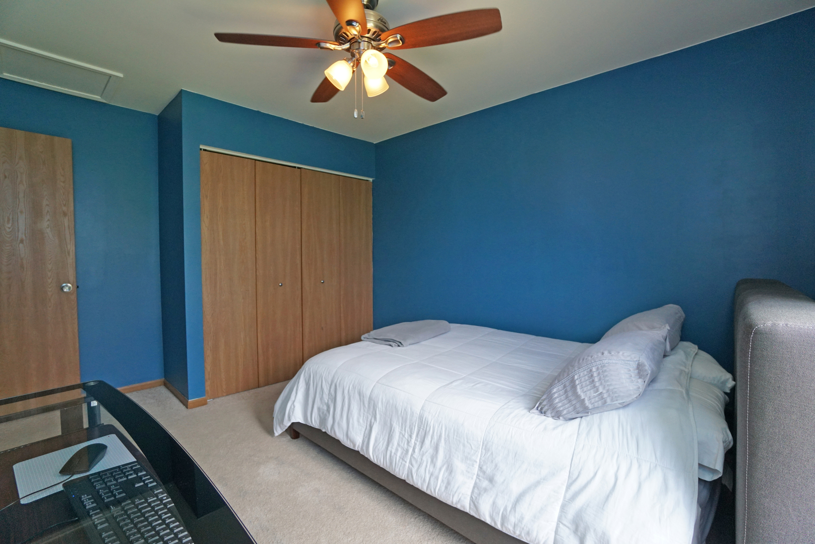 23 North Oltendorf Road Streamwood, IL 60107 - Photo 23 of 35 a bedroom with a bed and a chandelier