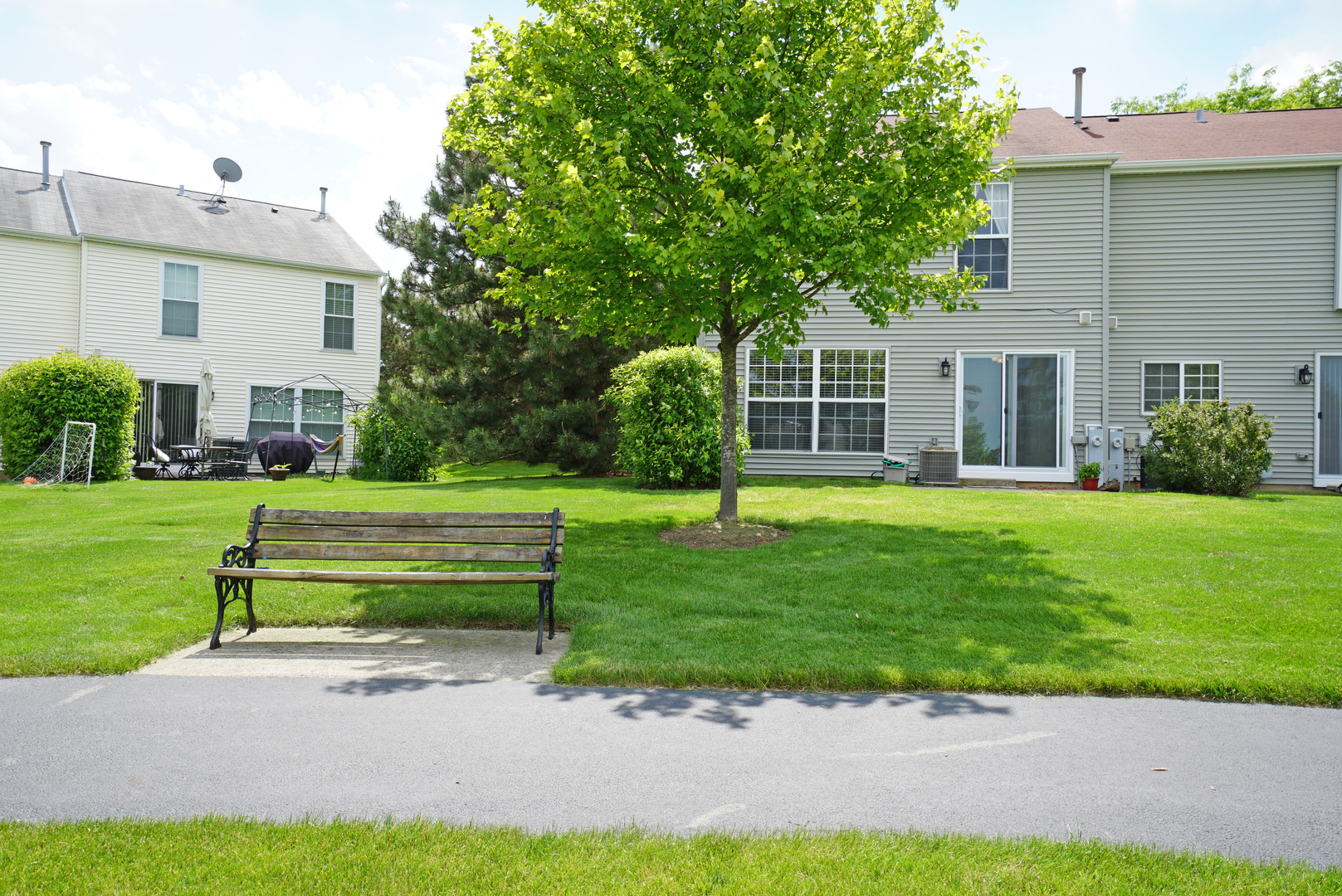 23 North Oltendorf Road Streamwood, IL 60107 - Photo 28 of 35 a front view of a house with a yard and trees