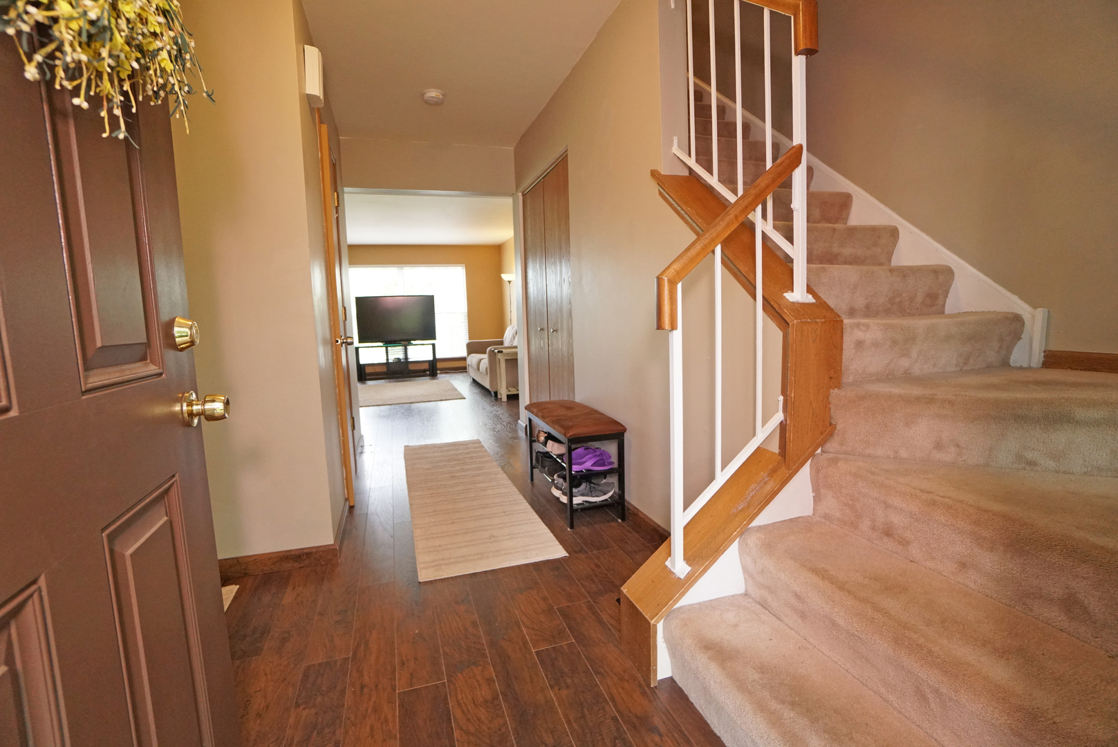 23 North Oltendorf Road Streamwood, IL 60107 - Photo 3 of 35 a view of entryway and hall with wooden floor