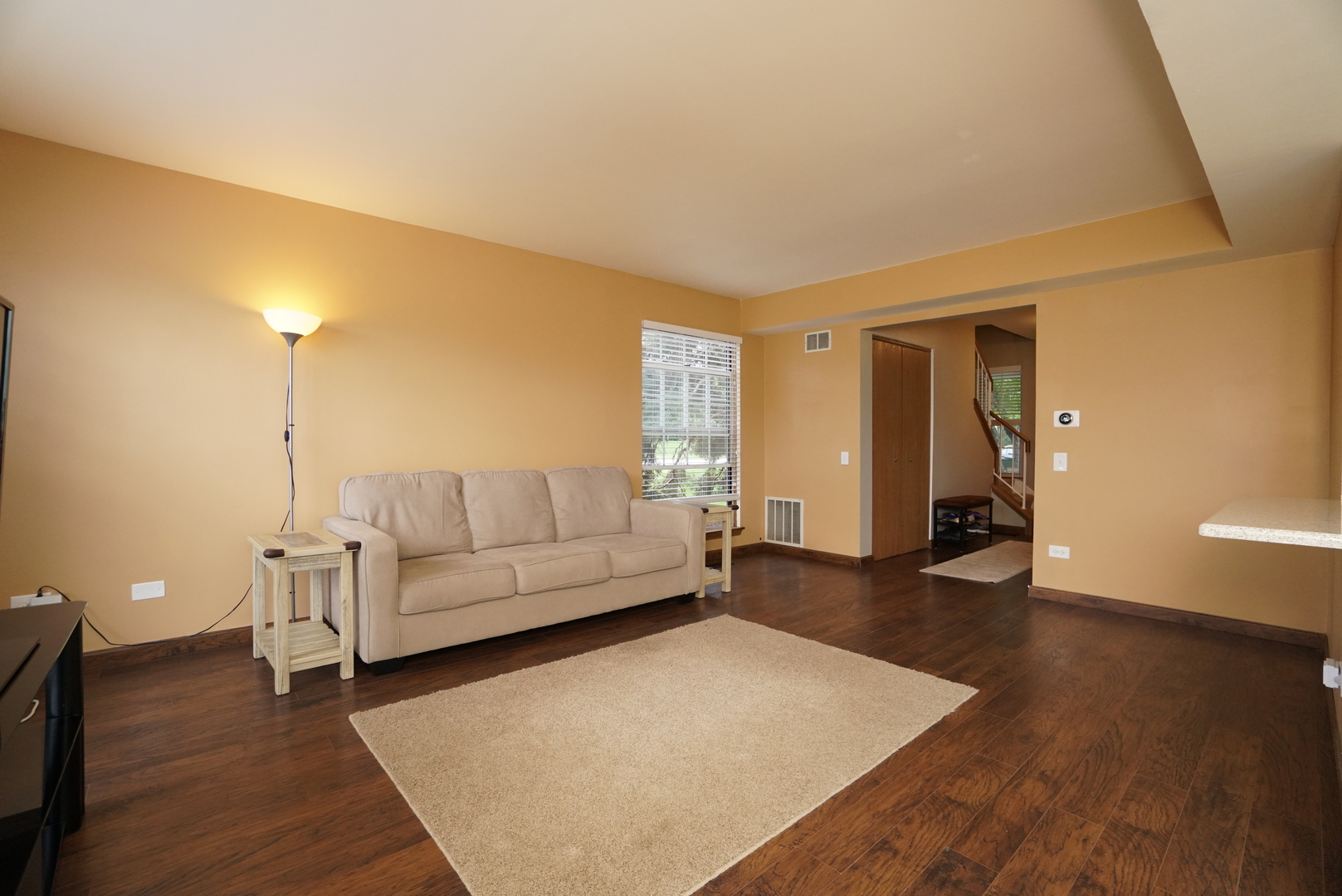 23 North Oltendorf Road Streamwood, IL 60107 - Photo 4 of 35 a living room with furniture and a wooden floor