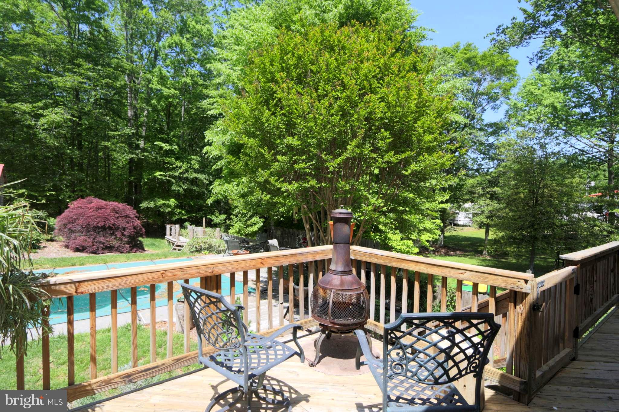 41 Wood Landing Road Fredericksburg, VA 22405 - Photo 14 of 54 a view of a two chairs in the deck
