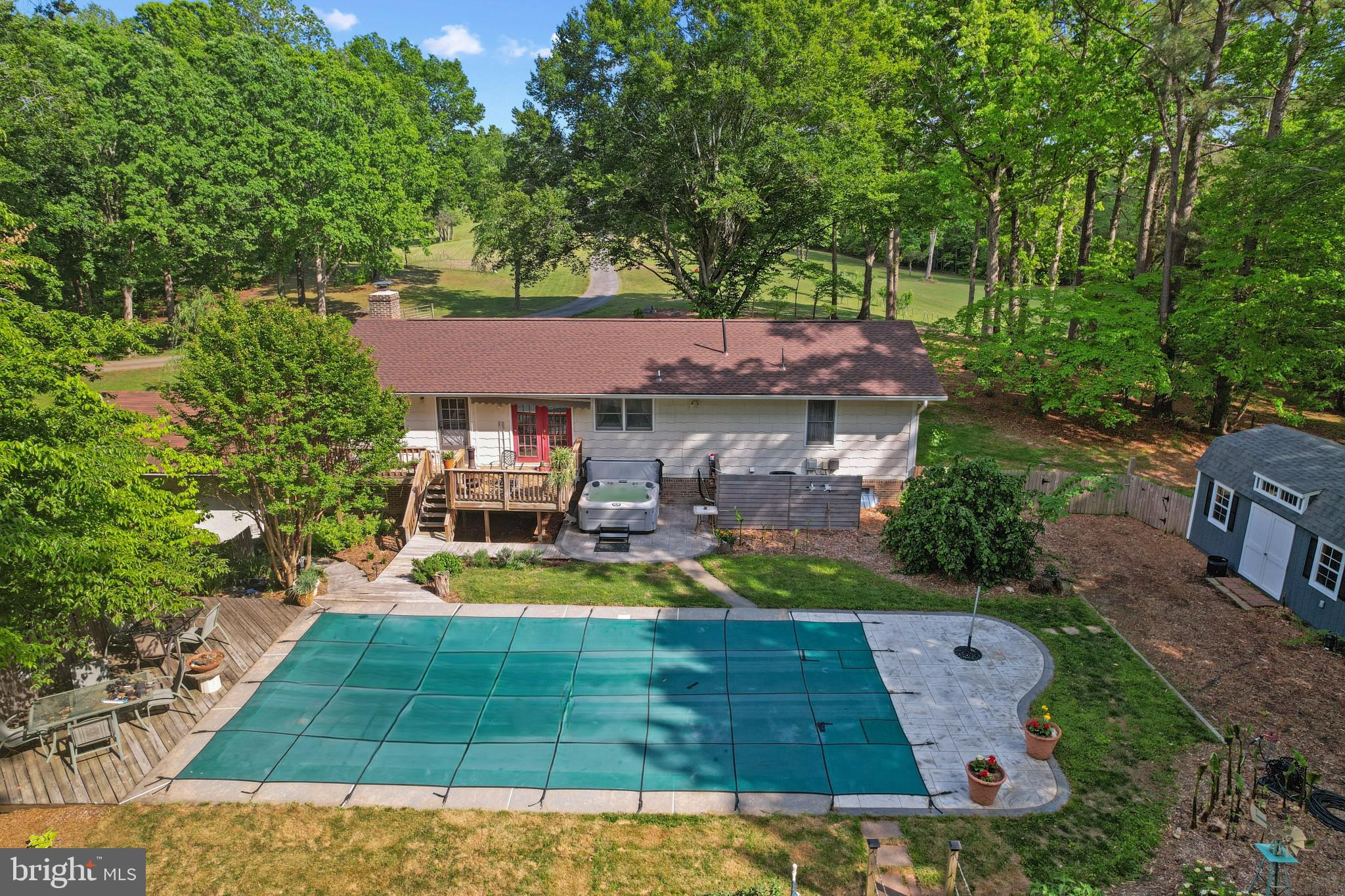41 Wood Landing Road Fredericksburg, VA 22405 - Photo 16 of 54 a view of a patio with table and chairs and potted plants
