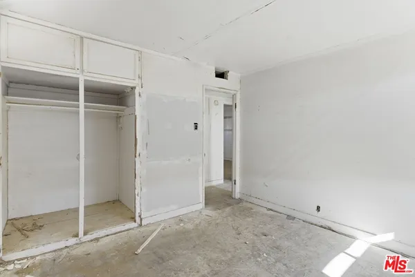 a view of hallway with shower