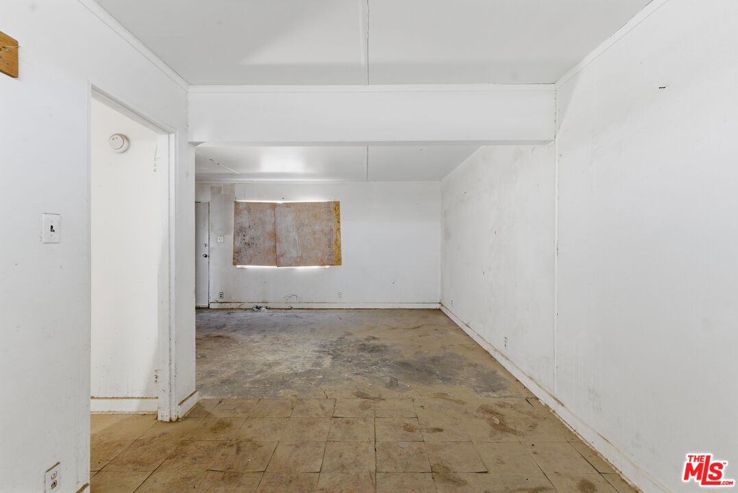 13879 Carson Street Trona, CA 93562 - Photo 20 of 29 an empty room with a empty space and window