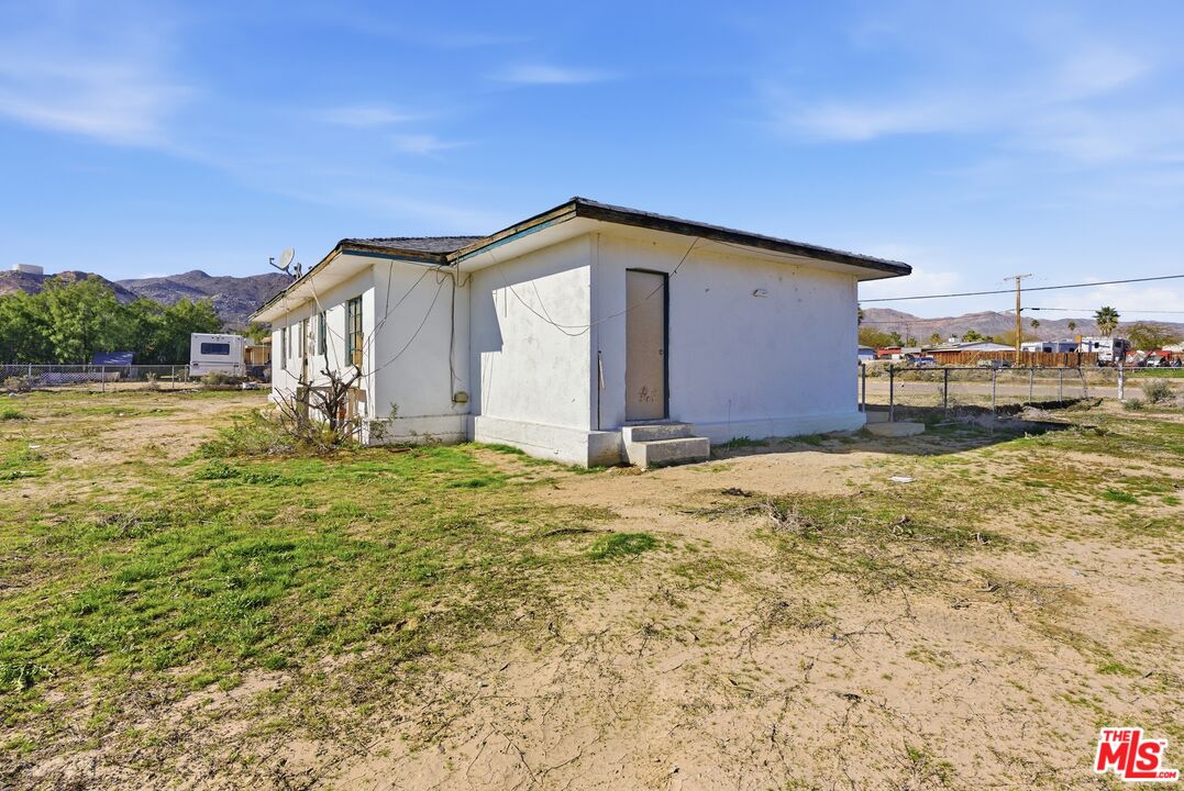 13879 Carson Street Trona, CA 93562 - Photo 27 of 29 a view of a house with backyard