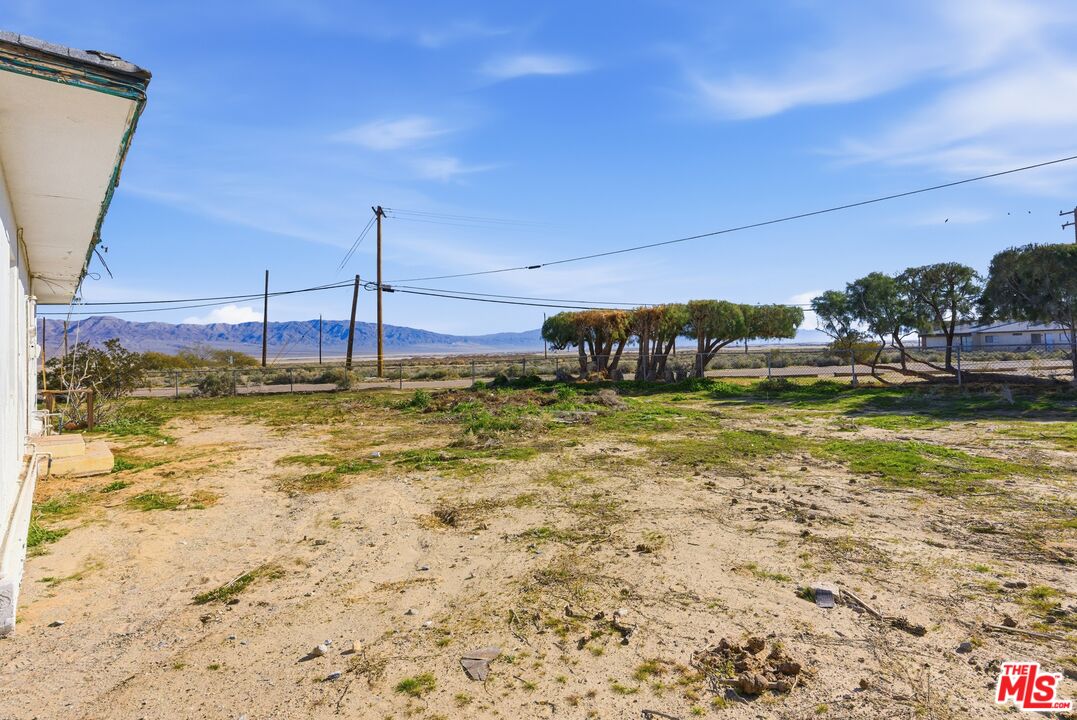 13879 Carson Street Trona, CA 93562 - Photo 29 of 29 a view of a pool with lawn chairs