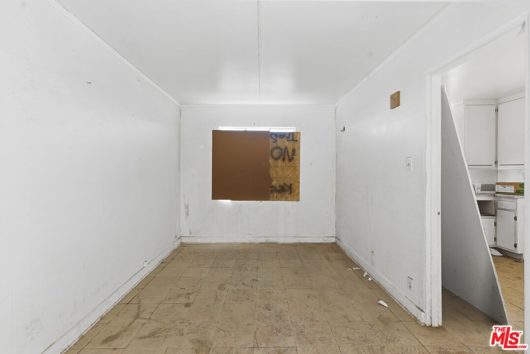 13879 Carson Street Trona, CA 93562 - Photo 9 of 29 a view of hallway with window