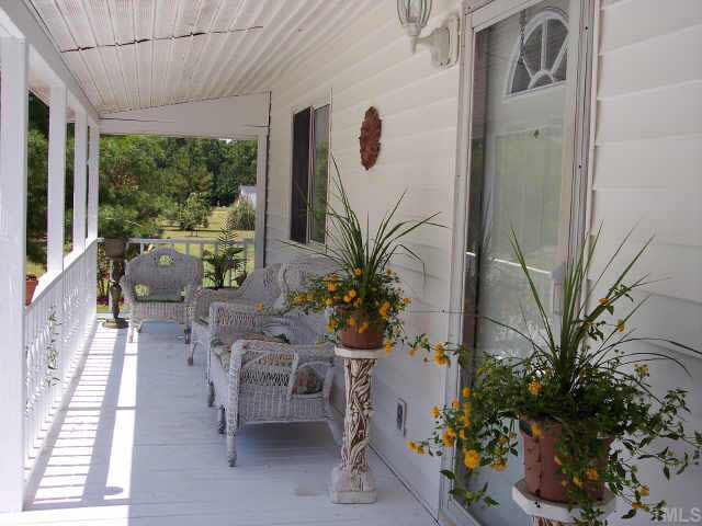 740 Capps Road Selma, NC 27576 - Photo 2 of 7 Bring your rocking chairs!