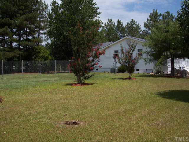 740 Capps Road Selma, NC 27576 - Photo 6 of 7 Large side yard, unrestricted!
