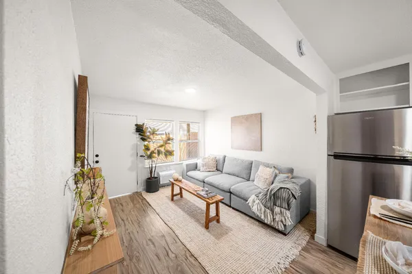 a living room with furniture and a couch