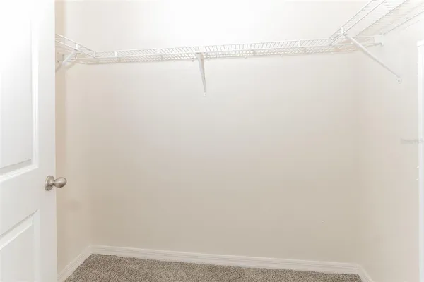 a view of small space with racks on the wall