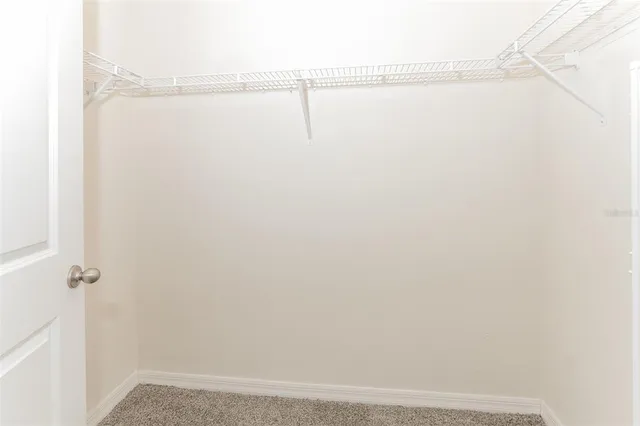 a view of small space with racks on the wall