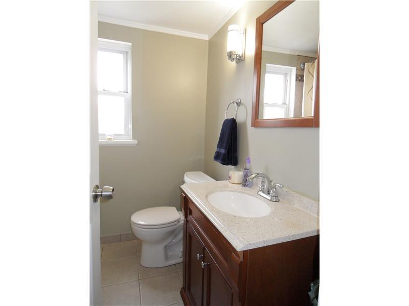 5227 Verona Road Verona, PA 15147 - Photo 12 of 24 Master Bath/Spa. Newly remodeled Master Bath with tile floor and tub/shower, New Vanity and Commode.