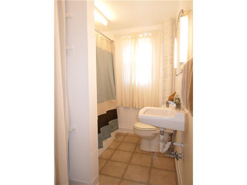 5227 Verona Road Verona, PA 15147 - Photo 16 of 24 Full Bath. Full Bathroom on the first level with tile floor and large storage/shelved area.