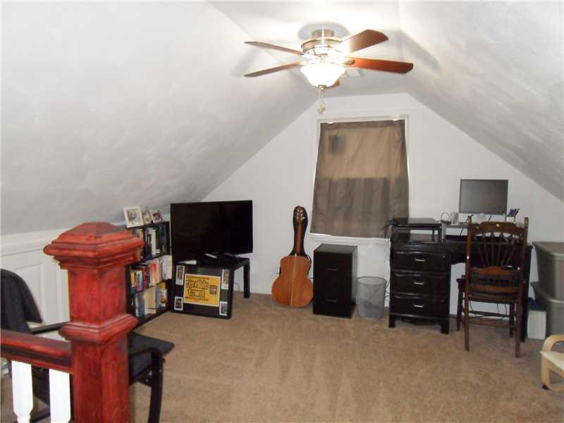 5227 Verona Road Verona, PA 15147 - Photo 18 of 24 Bedroom. Measuring 13x11 and with lots of storage in the eaves, this space could be used as a home office or den.