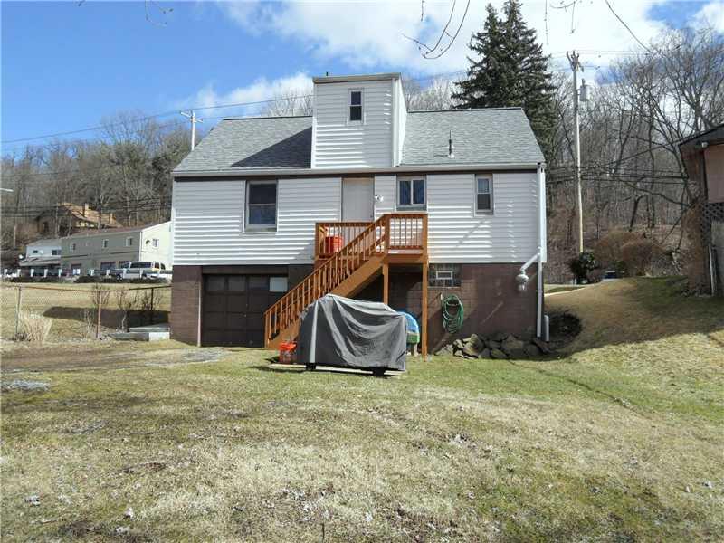 5227 Verona Road Verona, PA 15147 - Photo 23 of 24 Exterior Back. One Car, integral garage measures 11x22.