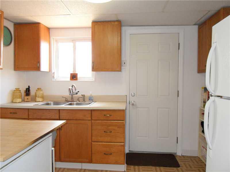 5227 Verona Road Verona, PA 15147 - Photo 8 of 24 Kitchen. The Kitchen measures 12x8 and is equipped with a newer refrigerator. Also includes a gas stove, and dishwasher.