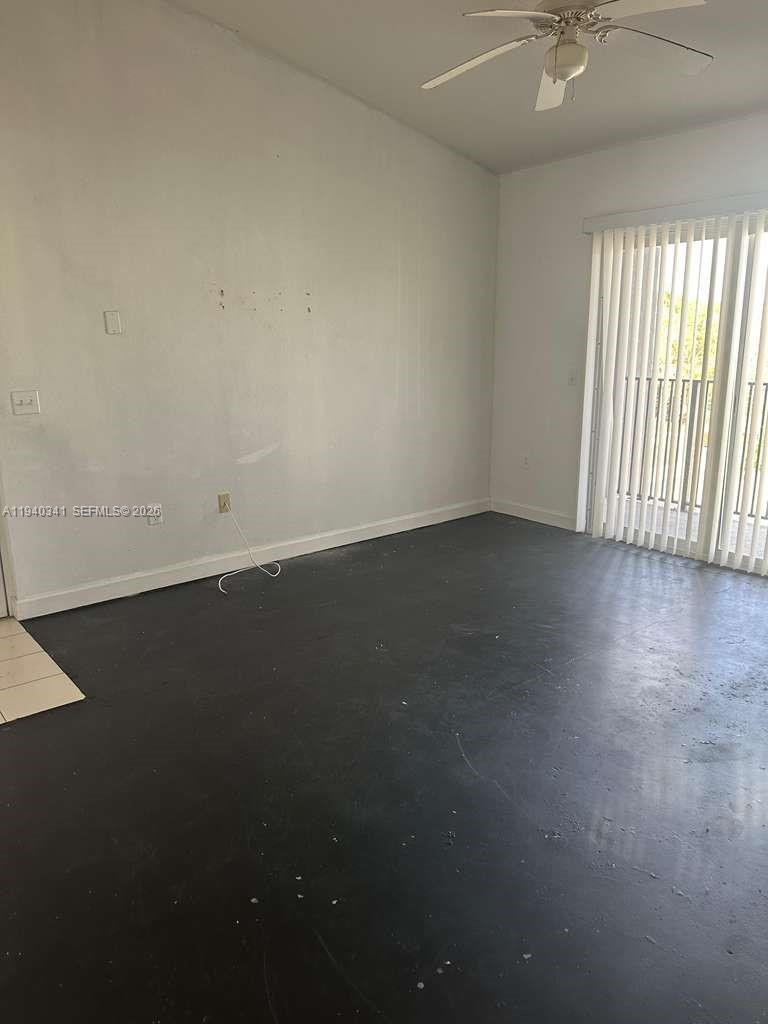15460 Southwest 284th Street, Unit 4301 Homestead, FL 33033 - Photo 13 of 17 an empty room with a window
