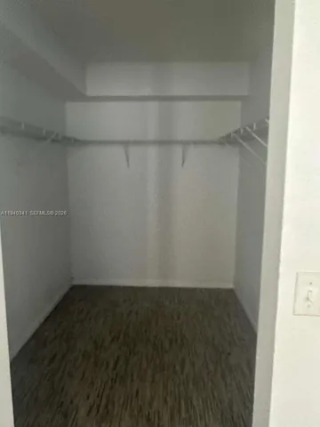 a kitchen with stainless steel appliances granite countertop a sink and a stove