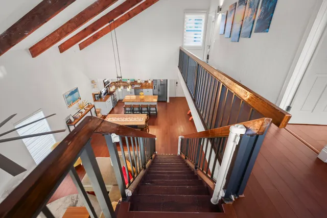 a view of living room with furniture and a couch