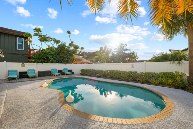 a view of a house with a swimming pool