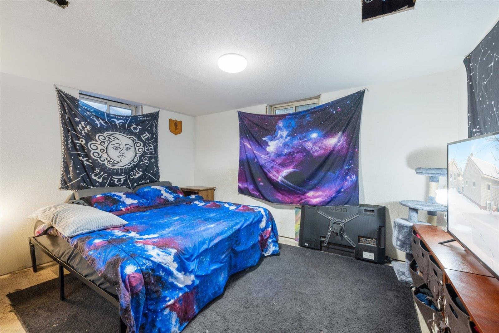24 Fern Court Babbitt, MN 55706 - Photo 25 of 41 Bedroom featuring carpet floors and a textured ceiling