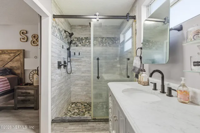 a view of a livingroom with furniture and window