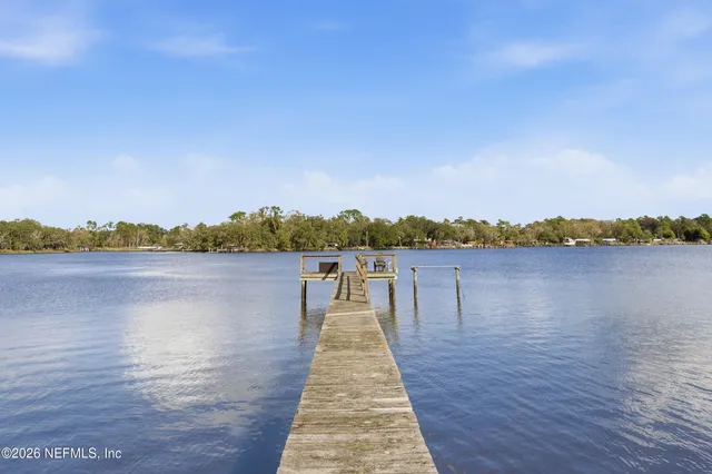 a view of a lake with a city