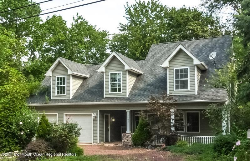 799 Leonardville Road Leonardo, NJ 07737 - Photo 2 of 25 front view of residential house with a yard