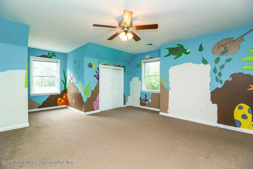 799 Leonardville Road Leonardo, NJ 07737 - Photo 16 of 25 a view of a room with gym equipment
