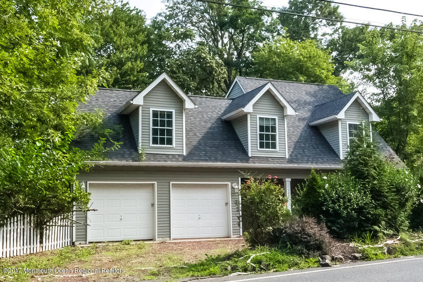 799 Leonardville Road Leonardo, NJ 07737 - Photo 3 of 25 a house view with a garden space