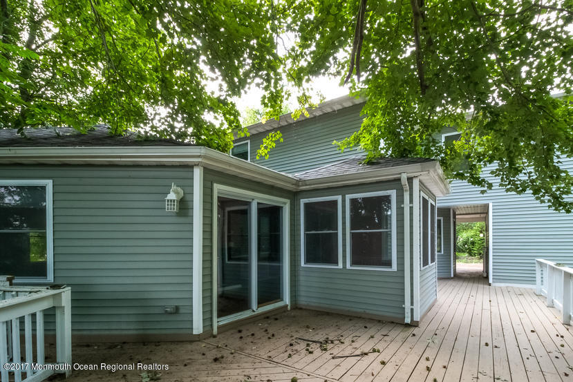799 Leonardville Road Leonardo, NJ 07737 - Photo 22 of 25 a front view of a house with a garden